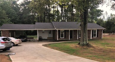 Front View with new concrete driveway
