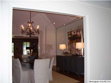Look into dining room from foyer. Approx 15'6