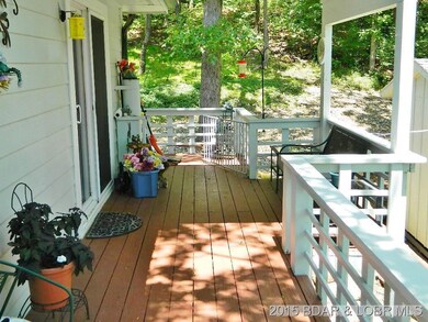 COVERED DECK ON SIDE OF HOME