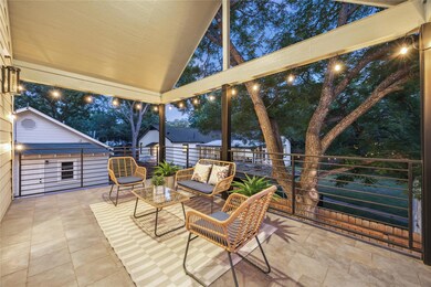 Patio at twilight featuring an outdoor hangout ar