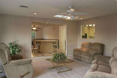 Family room, breakfast counter/bar, and pass throu