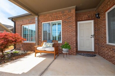 Perfect front porch for morning coffee, an evening cocktail, or chatting with neighbors.