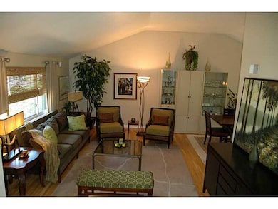 Living Room. Open living and dining with high ceil