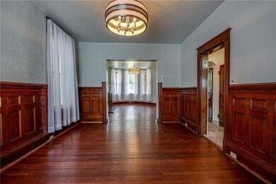 Dining room open to living room and kitchen