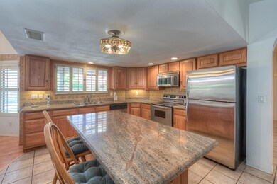 Kitchen Island, Granite & Stainless Apps