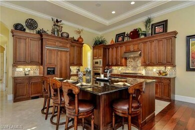 Luxurious gourmet kitchen with over-sized center i