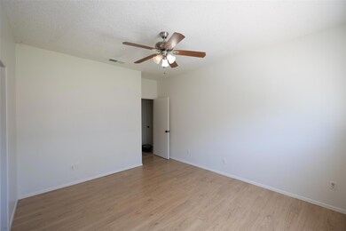 Spare room featuring visible vents, baseboards, c