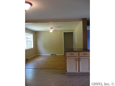 Living Room. VIEW FROM KITCHEN LOOKING INTO THE LI