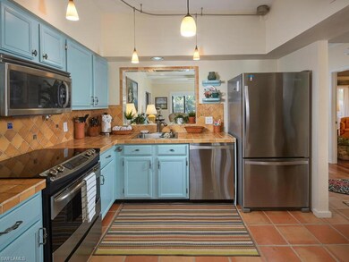 The kitchen is convenient to living/dining room. E
