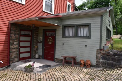 Entrance to lower level Unit 1 & laundry room.