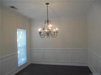 Elegant Formal Dining Room with Crown Molding, Cha