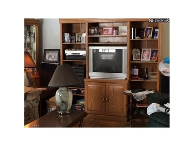 Entertainment Formal Living Room with Hardwood Flo