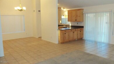 Formal Dining & Partial view of kitchen
