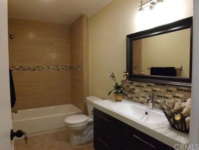 Brand new master bathroom has tray sink, glass til