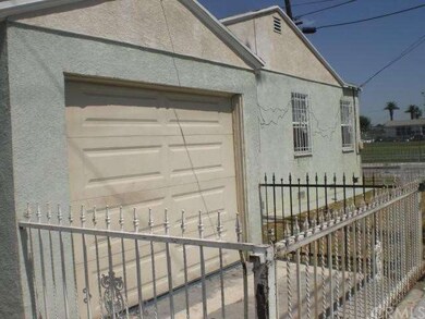 front house  side view attached 1 car  garage with