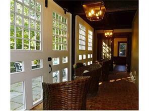 Other. Original carriage doors have storms over or
