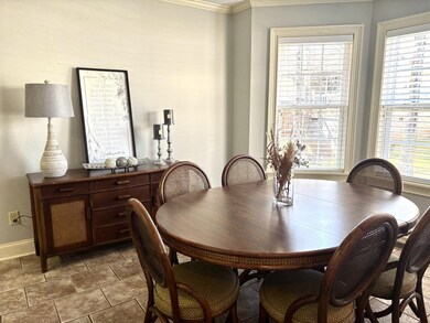 Dining space featuring baseboards