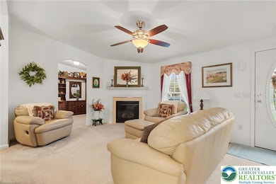 Living Room has great volume space ~ vaulted ceiling ~ Gas fireplace sets the ambiance ~