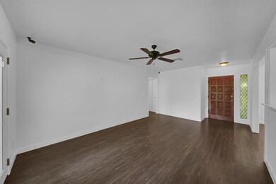 Experience the welcoming front entry and living ro