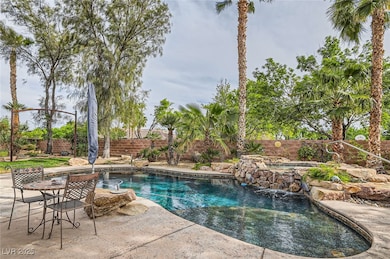 View of pool featuring a fenced backyard, a patio