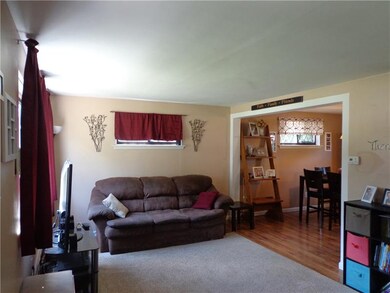 Bright Living Room opens into Dining Room