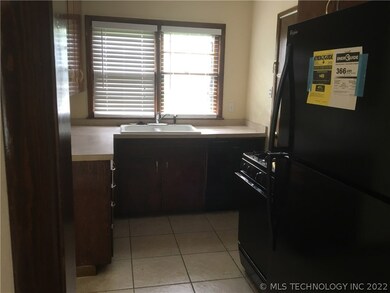 Kitchen dishwasher and disposal -tile floor