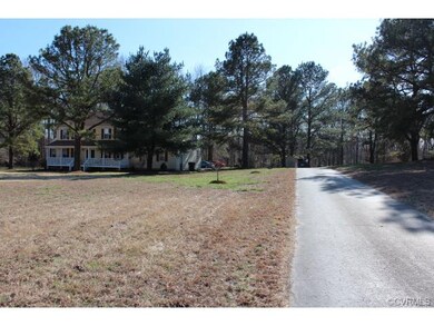 Long private driveway connects you to the back par