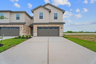 View of front of home featuring concrete driveway