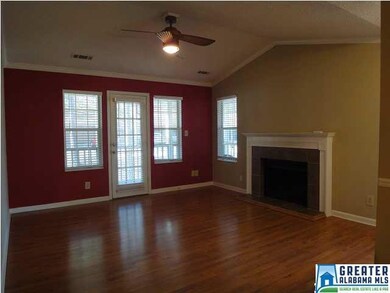 Living room with vaulted ceiling, wood-burning fir