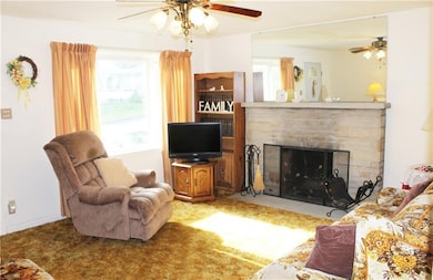 The bay window in the living room lets in lots of 