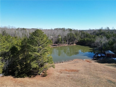 Water view featuring a forest