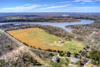 Drone Photography Field and wooded area on right,