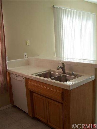 Newer stainless steel kitchen sink and bar which o