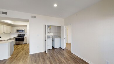 Kitchen featuring a sink, stainless steel applianc