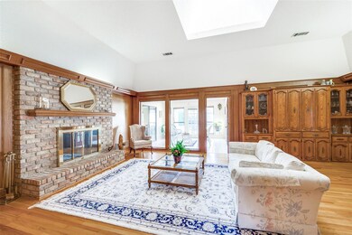 Living room featuring light hardwood / wood-style 