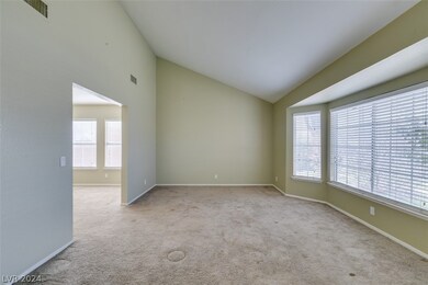 Front living room with large windows