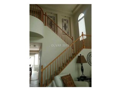 Property Photo. Dramatic front formal entry!