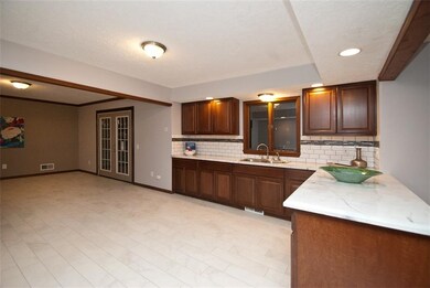 The large kitchen has new cabinetry and stainless 