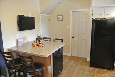 Note the updated dishwasher inside the built in ta