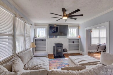 Spacious living area with cozy wood pellet stove