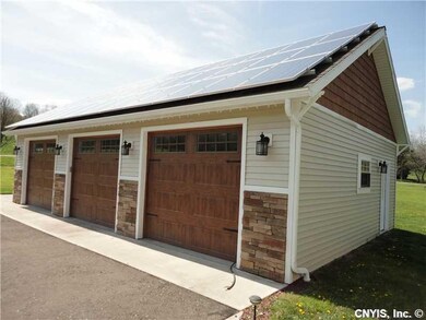 Garage. Large 3 car garage with overhead storage p