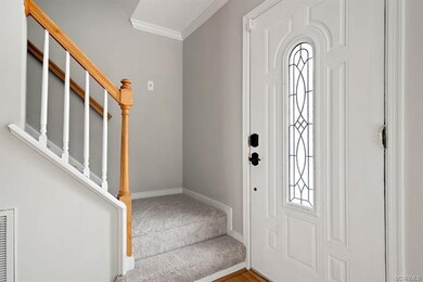 Foyer leading to the stairwell. Freshly painted do