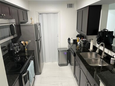 2425 NW 33rd St unit 1305, Oakland Park, FL 33309 - photo 6