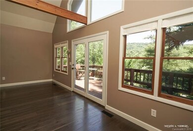 Opens to deck.  Beautiful looking  out