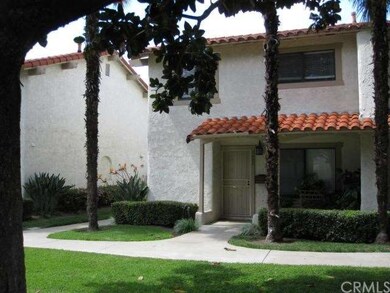 Front showing walk way to the left that goes aroun