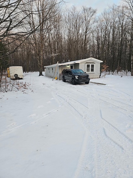 7351 Larkspur Dr, Mancelona, MI 49659