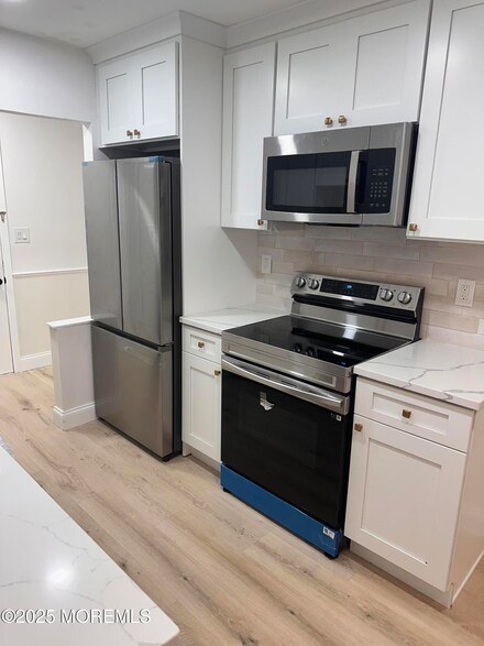 32 Meadow Green Cir Unit F, Manalapan, NJ 07726