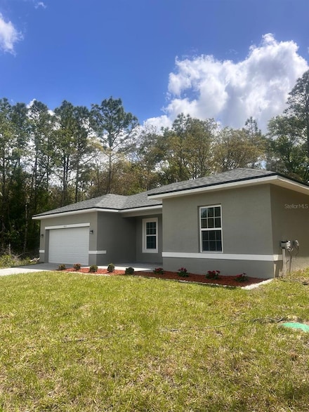 9451 N Emellia Ave, Citrus Springs, FL 34433