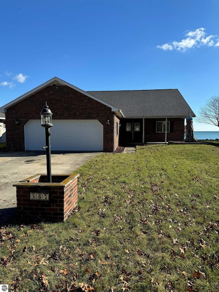 587 Pine Ln, East Tawas, MI 48730