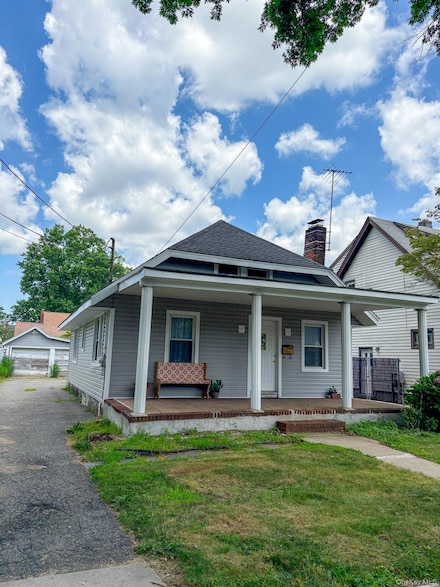 76 Henry St, Roosevelt, NY 11575